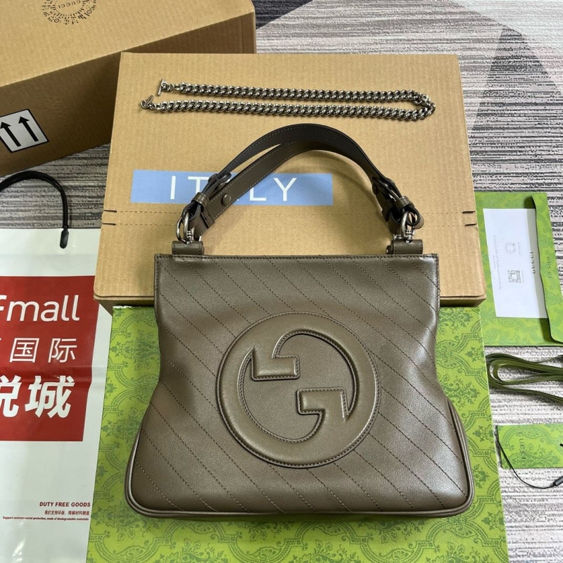 G*u*i top handle bags